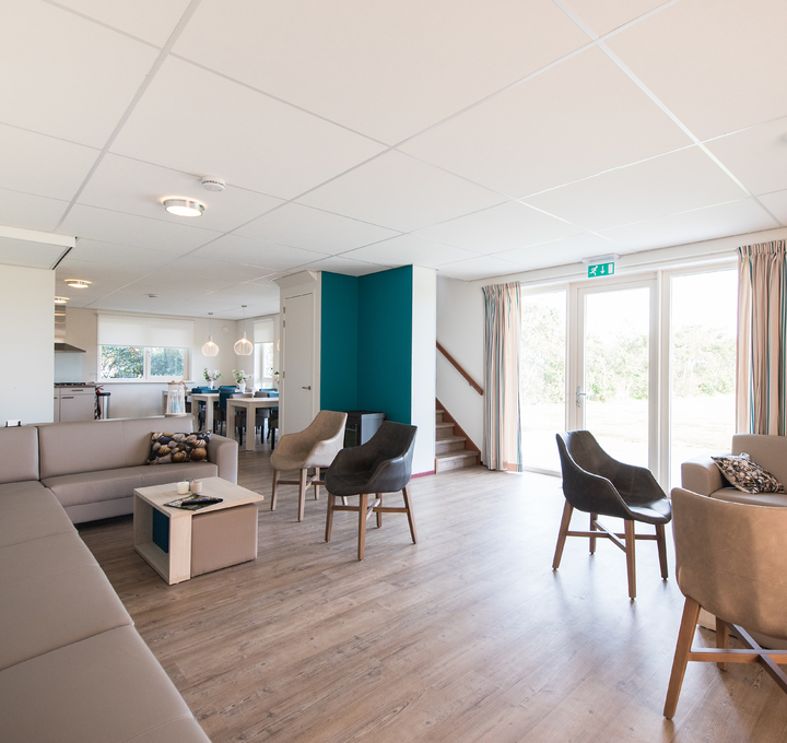 Gruppenhotel Oranjerie - Wohnzimmer